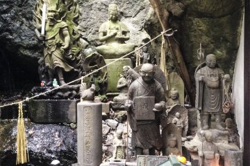 A unique display of various Buddhist deities and figures including an extremely curious version of Fudō Myō-ō who is seen here with the head of a dragon.