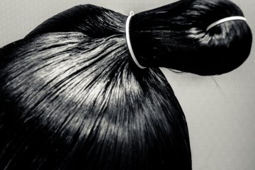 <p>Traditional sumo style hair</p>