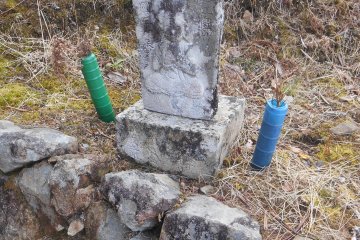 <p>One of the many statues of Kannon that line the path</p>