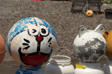 Local garden décor using buoys, in Teppu