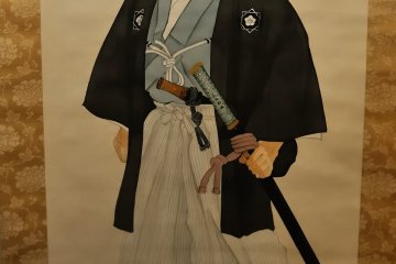 <p>This is the portrait painting of Ryoma Sakamoto, one of the most iconic samurai warriors in the era. He is one of the prominent samurai warriors who risked their lives before and after the turbulent Meiji Restoration.</p>