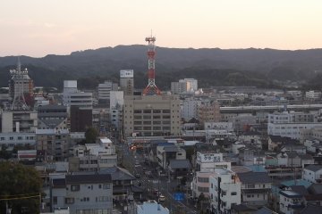 <p>Looking back at the town, you can see the bullet trains zooming through</p>