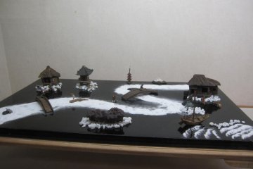 Tea set used for play. It is lined with sugar