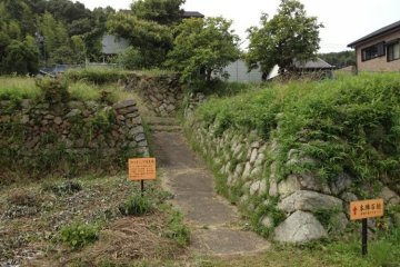 Castle like stone foundations behind the old inn.
