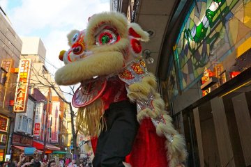 Many merchants participate in the Lion Dance and visitors flock to witness the excitement for the New Year