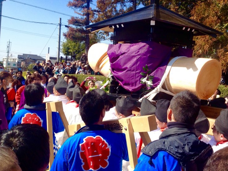<p>The mikoshi is hoisted up by a group of men all aged 42, and carried with much excitement to the main shrine.</p>