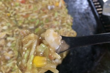 <p>After a while, stir it again and start eating from the rim when it's grilled enough.&nbsp;It is really fun to cook and eat it with a tiny spatula which is called "Kote".　This is the "Monkichi Special Monja".</p>