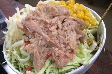 <p>Staff will bring you a bowl that comes with all ingredients and liquid dough. This is the "Tuna Corn Cheese Monja".</p>