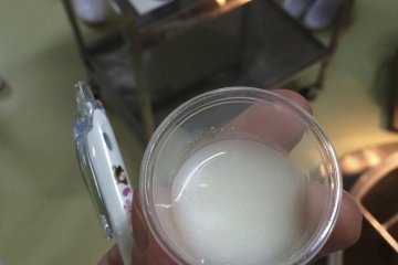 <p>Tasting the sake&nbsp;during fermentation and before filtering. It's very sweet and sparkly.&nbsp;</p>