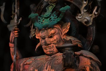 <p>A statue of Tamonten standing at the middle gate, guarding the north direction from evil</p>