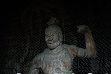 <p>Statue of Nio, muscular guardian of the Buddha, stands just inside the gate</p>