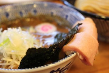Dipping broth with extra ingredients