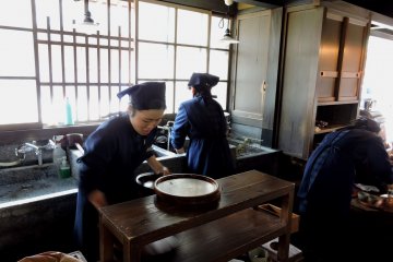 <p>A very old-fashioned kitchen at Akafuku Sweets store</p>