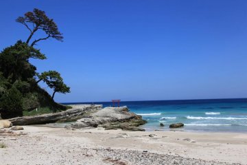 Shirohama beach, with the torii gate to Shirohama shrine