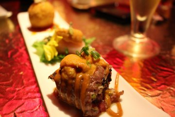 <p>Sampler platter with mix of meat and crab selections</p>