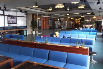 <p>The lounge by reception, where some people evidently like to nap</p>