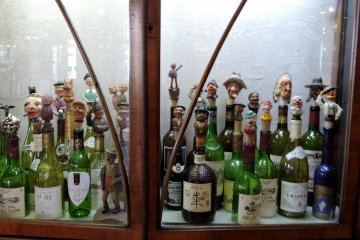 <p>Collection of humorous bottle stoppers</p>