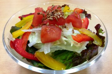 The green salad with a Japanese&nbsp;soy and sesame seed wafu style dressing. The combination of&nbsp;ginger, rice vinegar and soy brings the salad to life.