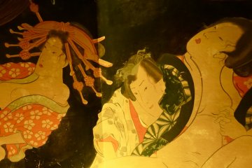 <p>The painting on the wall is also known as "Shunga," a type of erotic ukiyo-e that developed in the Edo&nbsp;Period.</p>