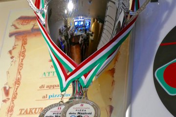 <p>International awards proudly adorn the kitchen</p>