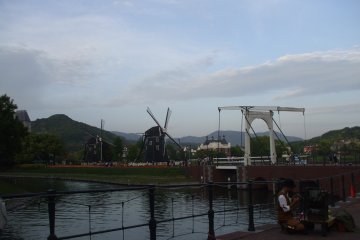 <p>View of the Dutch water mills and drawbridge</p>