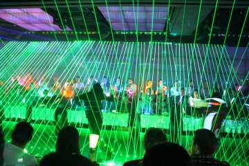<p>Light show begins and the dancers take the stage</p>