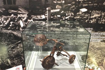 A tricycle found among the ruins:&nbsp;Hiroshima Peace Memorial Museum