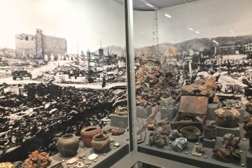Photo of the destruction and personal items found among the ruins:&nbsp;Hiroshima Peace Memorial Museum