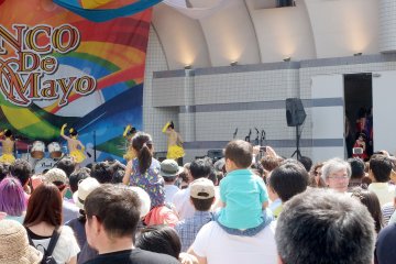 There are dancers of all ages involved including young children strutting their stuff and dancing to the music, dressed in traditional Latin costumes of course!