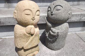 <p>Hanging out on the steps in front of the temple building</p>