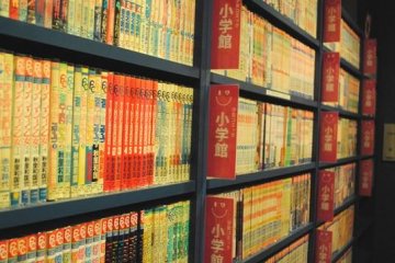Manga lines the wall of Popeye Media Cafe Hamamatsu