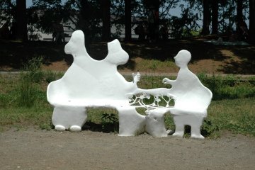 <p>This whimsical bench is the perfect spot to enjoy the view of the park's most popular building.</p>