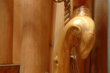 <p>Visitors take off their shoes, preserving the gorgeous polished wood and making it a pleasure to walk through.&nbsp;</p>
