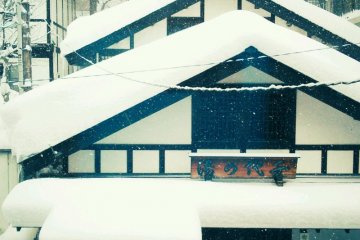 First thing in the morning when I got out of bed, checking to see if it was still snowing. The roof top had some snow from the day before, but it had snowed a fair bit over night. Place Address: 〒377-1711 Gunma-ken, Agatsuma-gun, Kusatsu-machi, Kusatsu, 367&minus;4