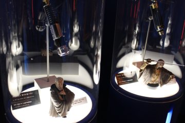<p>Original (as denoted by the black card on the left &ndash; white means replica) Jedi lightsabre props used in the movies&nbsp;&copy; &amp; TM Lucasfilm Ltd.</p>