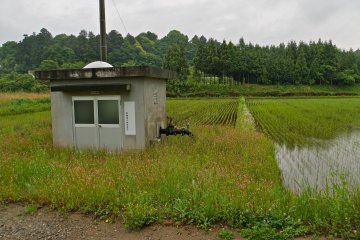 <p>An electrical water pump that feeds the surrounding rice fields.</p>