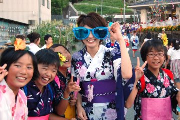 Teams that take part in the sasa odori procession and contest assemble beforehand and admire each other's costumes.