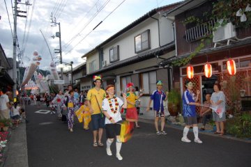 The Uchiko Town International Association lead the dancing procession in 2010 with a World Cup Soccer theme.