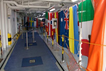 <p>The deck 3 boarding area of the cruise ship with international welcome</p>