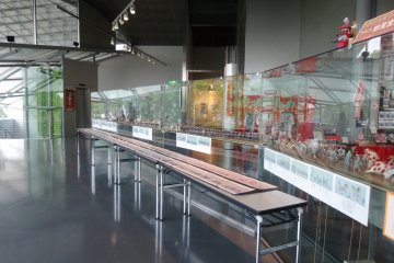 <p>A display in the central hall showcases the city's colorful Myoken Festival</p>