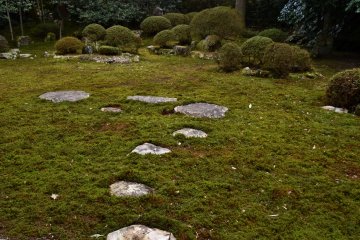 <p>Prayer stones laid out in the moss garden. Lords of Fukui Matsudaira Clan used to step on these stones to reach the main stone which represents the principal image of this temple, and offer prayers in front of it.</p>