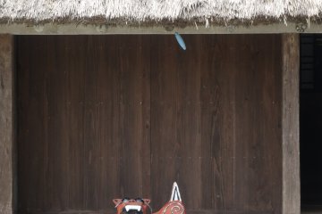 <p>It's rare to find a shisa sitting on a porch or veranda</p>