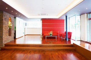 <p>Warm wood and brick interiors await you just inside</p>