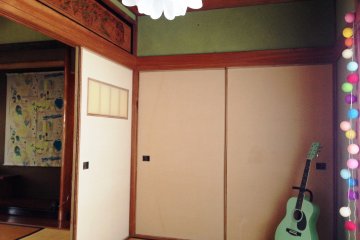 <p>Pastel guitars await a tuneful moment at Mizutamaya Cafe in Teshima.</p>