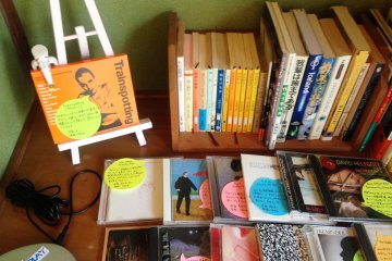<p>Next to the courtyard window, an old CD Walkman plays while you admire their hand picked collection of hipster music and novels.</p>