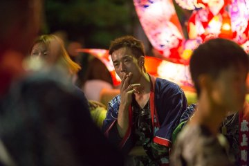 A pusher pauses to enjoy a smoke break