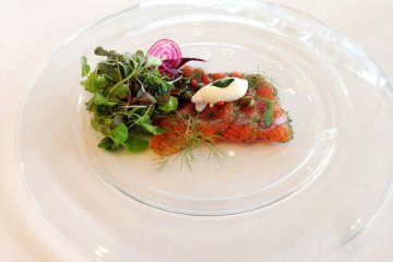 Marinated Sanuki Salmon with dill, Japanese pink pepper balls, lightly dressed micro leaf salad