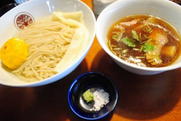 <p>Mazesoba. On the left is noodles in Kombu-sui, on the&nbsp;right is the dipping soup,&nbsp;with salt and wasabi seasoning</p>