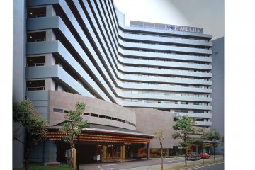 <p>Hotel exterior during the day</p>