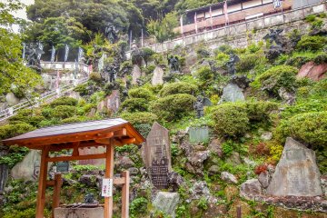 <p>As you look up along this hillside it`s impossible not to notice the dozens of figures looking down at you</p>